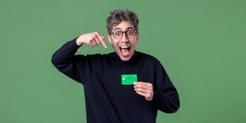 A guy using the American Express Green Card.