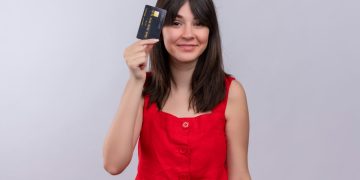 A girl using the Scotiabank American Express.