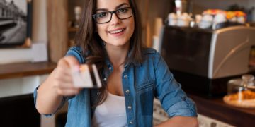 Woman learning how to use cash back rewards.