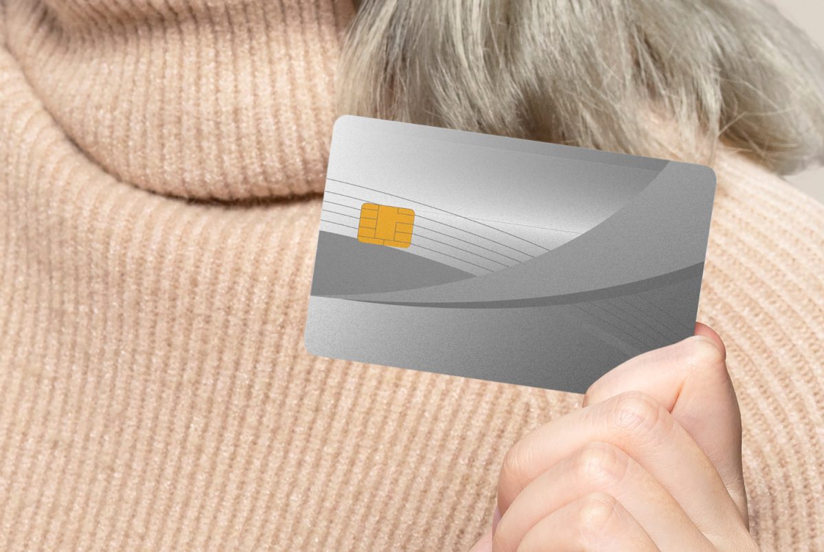 Someone holding a CareCredit Card.