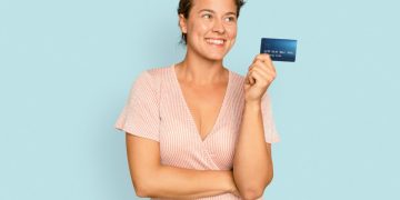 Woman happy with her Chase Freedom Unlimited card.