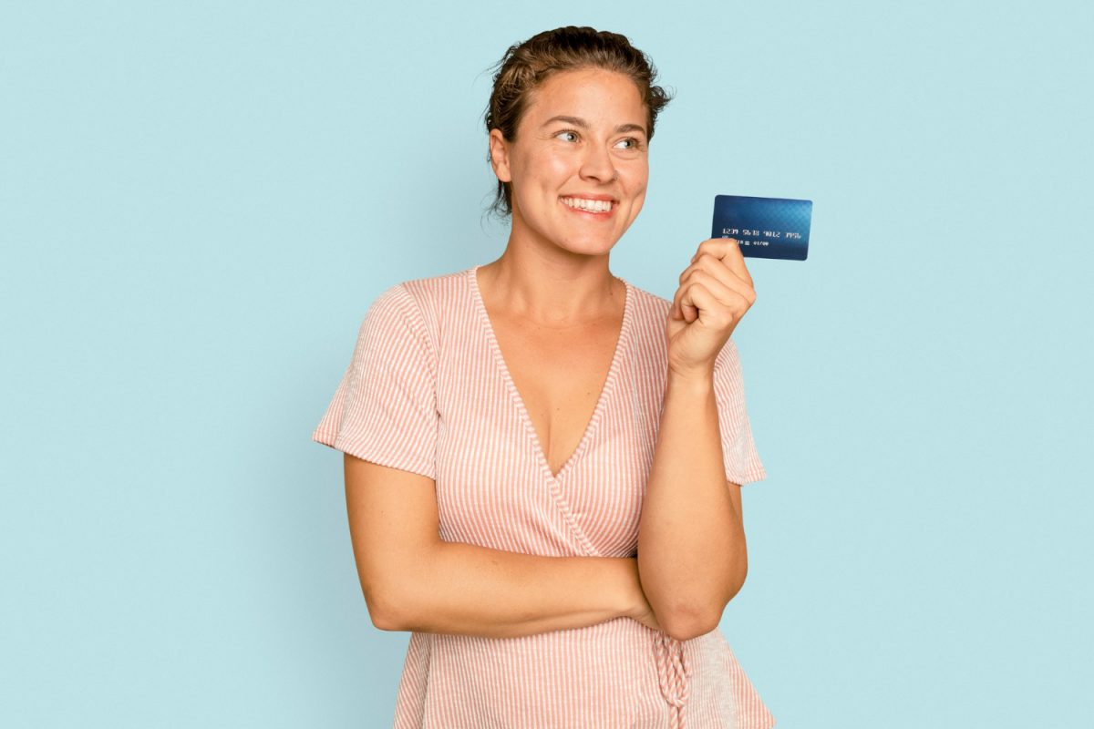 Woman happy with her Chase Freedom Unlimited card.