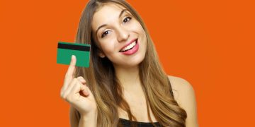 Woman happy with her Chime Credit Builder Secured Visa.
