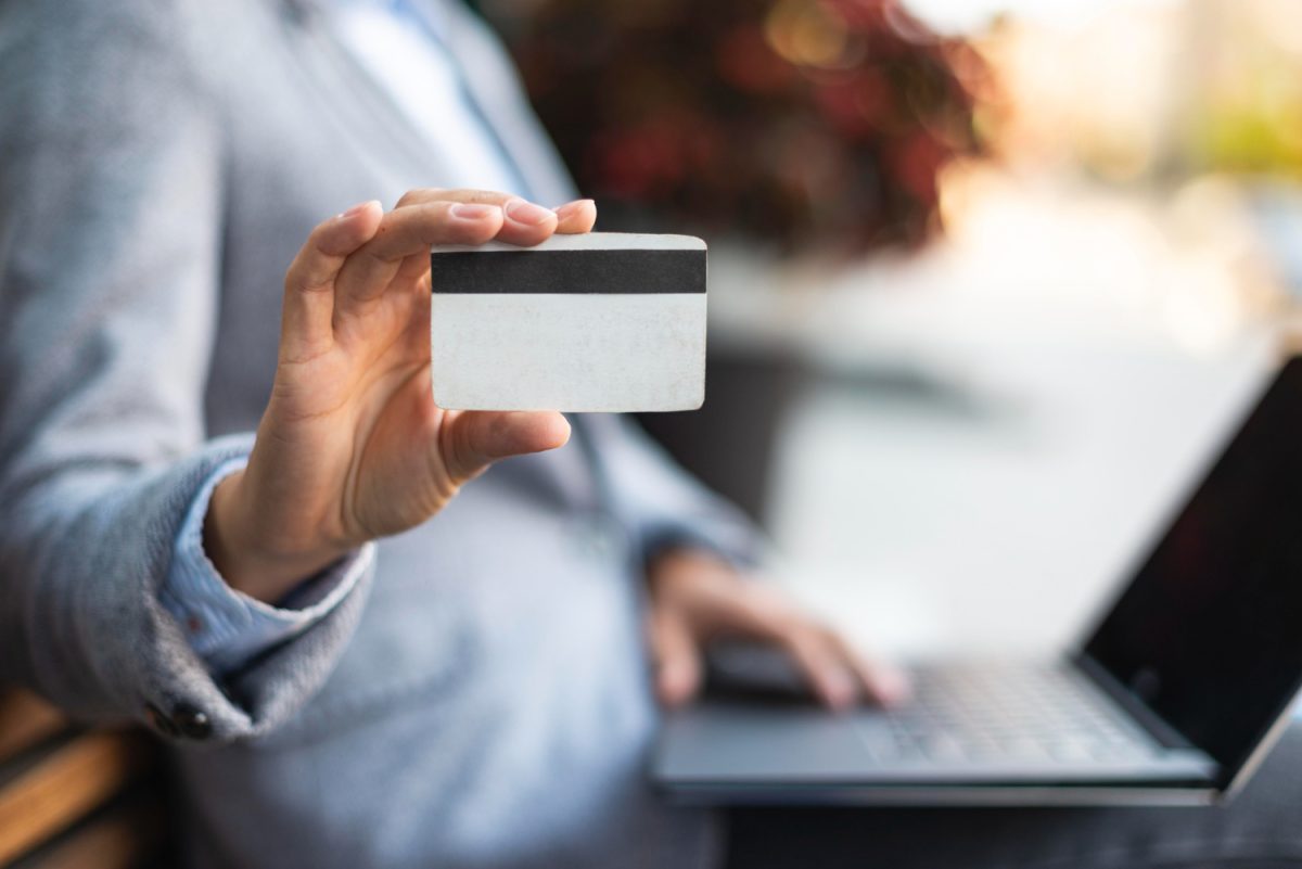 A man holding his Citi Premier Card.