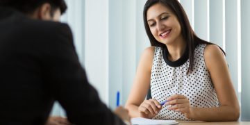 Woman and man looking for Health Insurance.