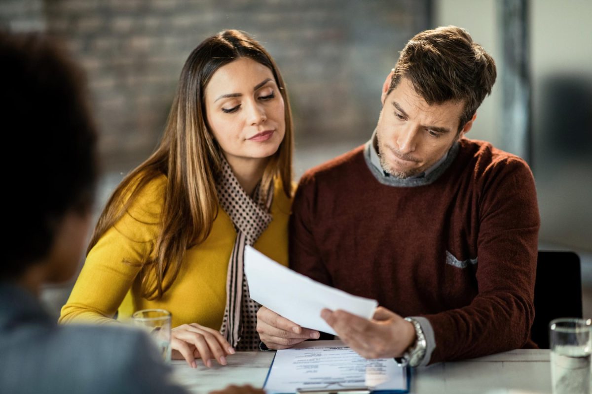 A couple looking for Types of Emergency Loans.