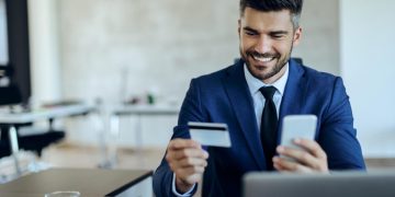 A man using his Business Credit Card.