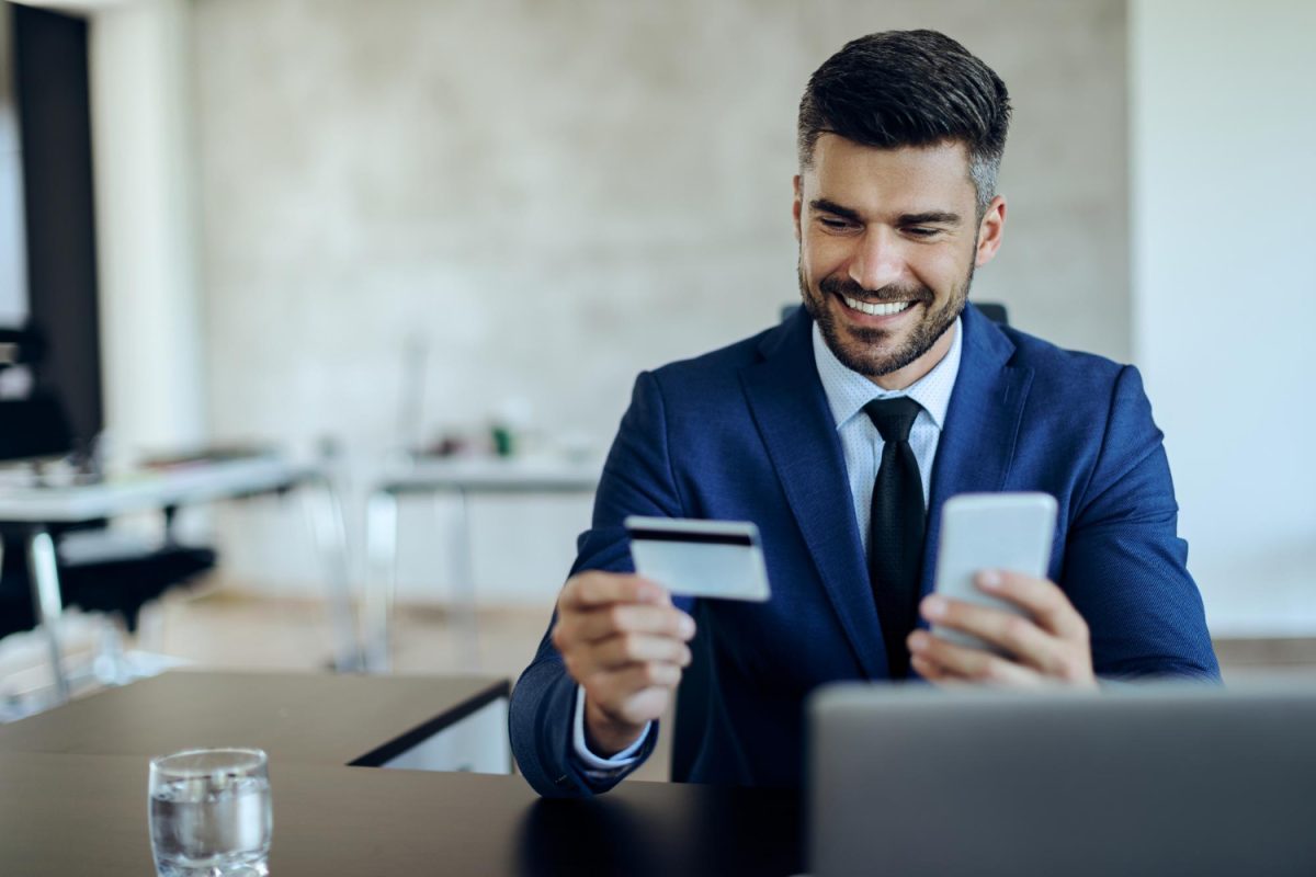 A man using his Business Credit Card.