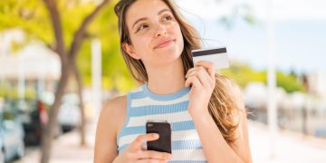 Woman learning about the Credit Card Closing Date.