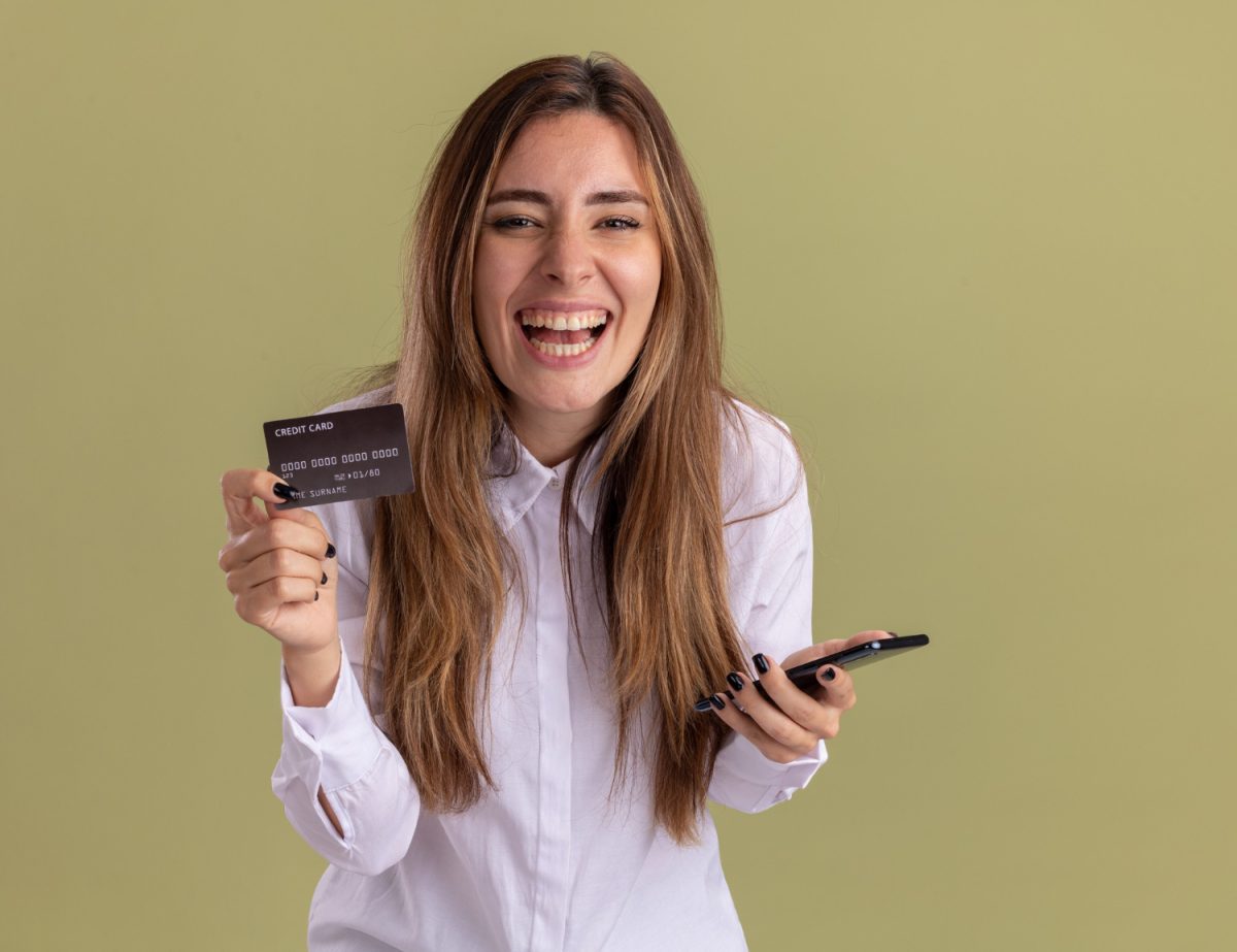 Woman happy with her No Fee Credit Card.