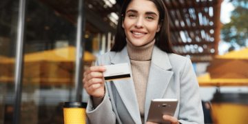 Woman using her Premium Credit Card.