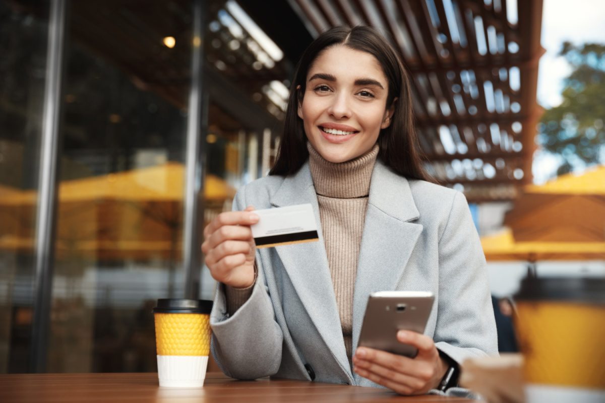 Woman using her Premium Credit Card.