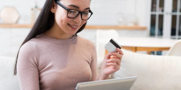 Woman checking her Credit mix.