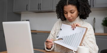 Woman checking her Credit utilization rate.