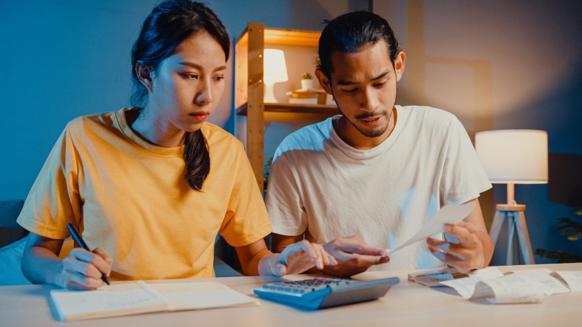 A couple learning How to share a credit card.