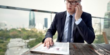 A man checking the Paydex score of his company.