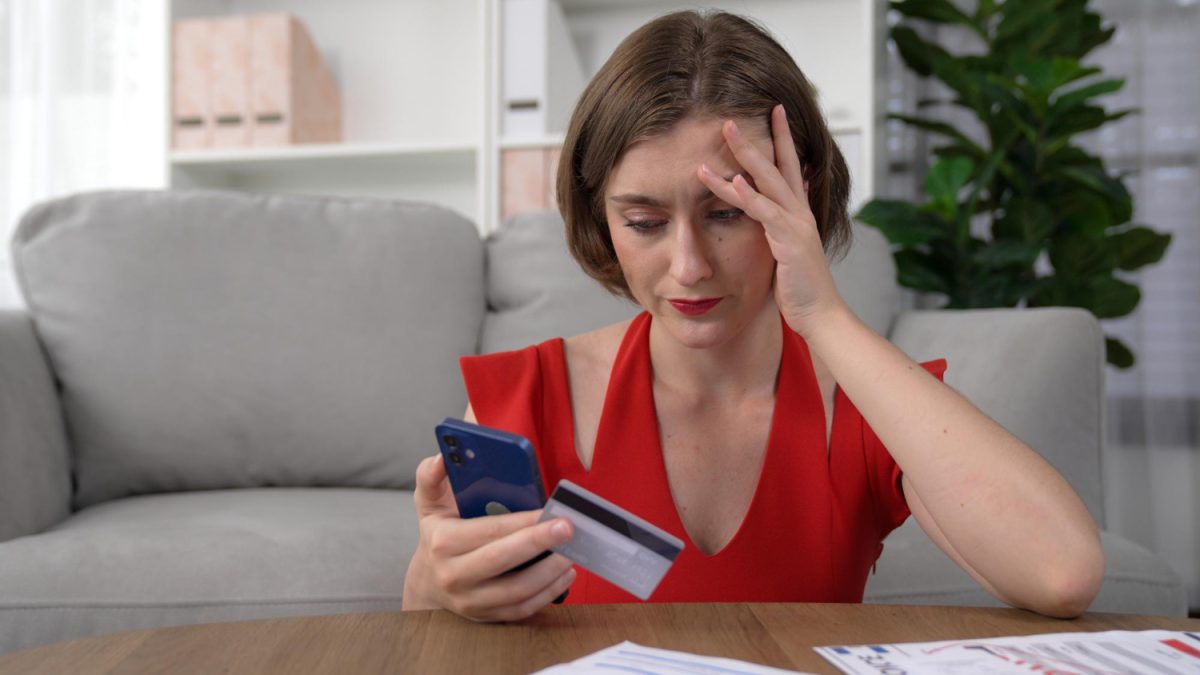 woman resolving negative balance on credit card